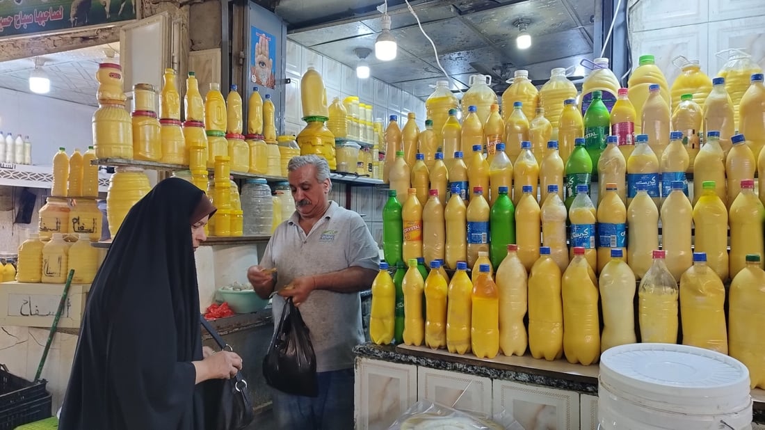 صور: رمضان في الحلة… دهن حر بـ30 ألفاً لمعالجة التمور وطبخ العنبر