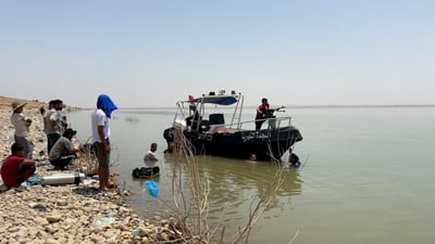 شاهد: غواصو الداخلية يجوبون قاع حمرين بحثاً عن جثة غريق بغدادي