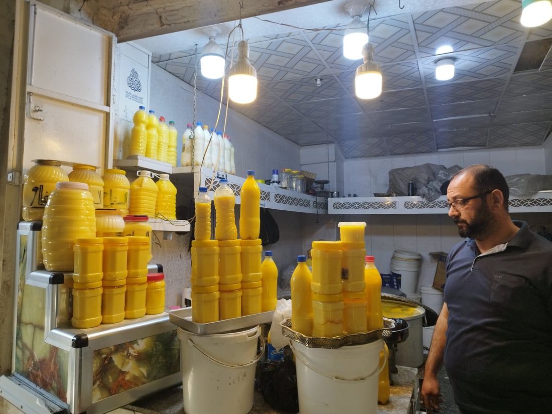 صور: رمضان في الحلة… دهن حر بـ30 ألفاً لمعالجة التمور وطبخ العنبر