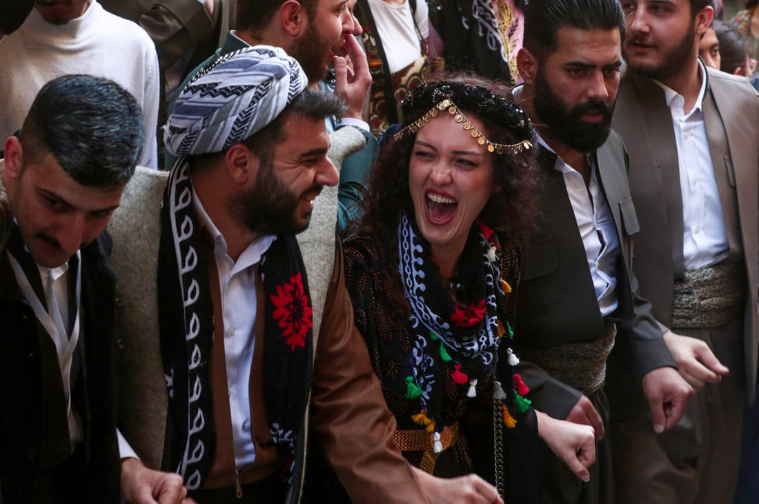 Iraqi Kurdish people celebrate the Nowruz New Year festival in the town of Akre (Photo by Safin HAMID/AFP)