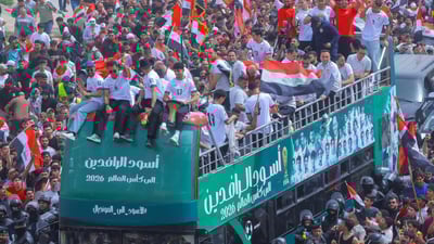 Crowds flood Baghdad streets to welcome team after World Cup qualification