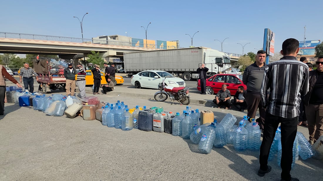 Fuel shortage in Kirkuki leaves locals queuing with bottles and jerrycans