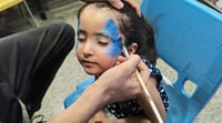 Face painting brings joy to Baghdad’s Zayouna neighborhood