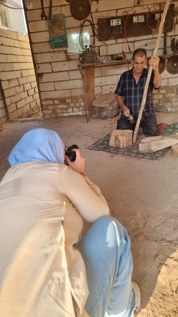 صور: الكاميرات تجذب فتيات ميسان.. تنافس مع الرجال لتوثيق حياة الشارع
