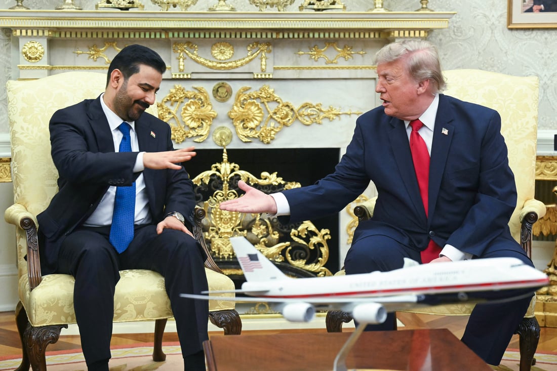 US President Donald Trump shakes hands with Prime Minister of Iraq Ali al-Zaidi (L) in the Oval Office of the White House in Washington, DC, on July 14, 2026. (Photo by SAUL LOEB / AFP)