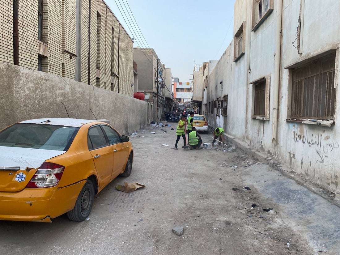 صور: جداريات ملونة بدل النفايات في أورزدي الناصرية.. حملة الشباب قرب جامع السعدون
