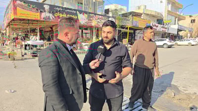 دوو برا لەسەر ئەرکی خۆیان مەنهۆڵێکی تێکچووی سەر شەقامێکی گشتییان چاککردەوە