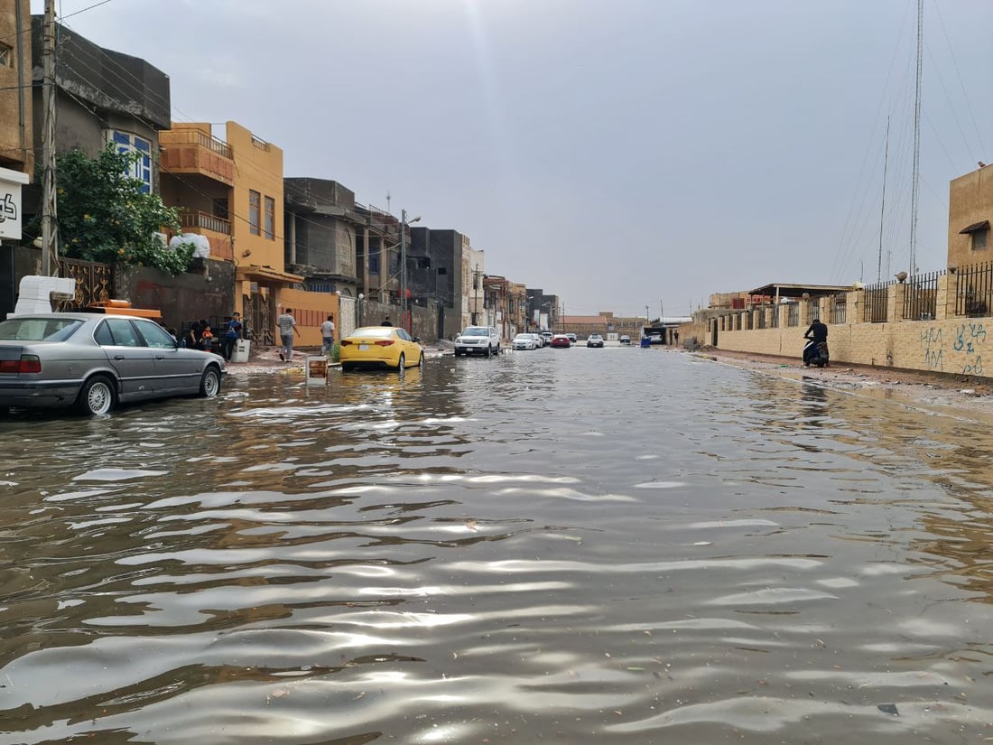 صور من السماوة اليوم: الأمطار أغرقت شوارع حي الصدر والضجرية والعسكري