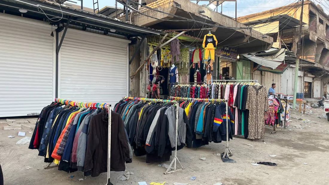 Second-hand winter clothes market in Basra offers global brands at bargain prices