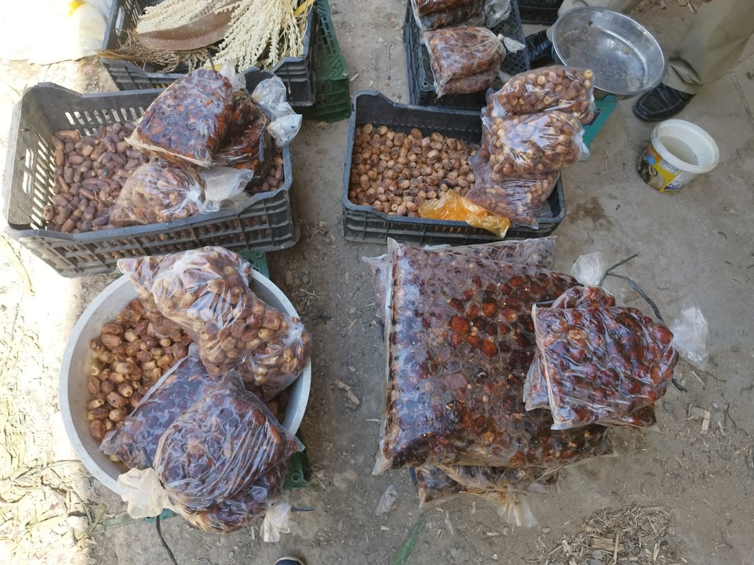 صور: رمضان في الحلة… دهن حر بـ30 ألفاً لمعالجة التمور وطبخ العنبر