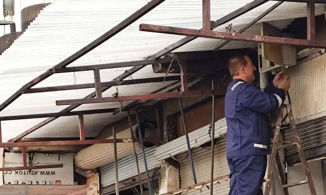 كارەبا بۆ دوكانەكانی دارەسووتاوەكە گەڕێندرایەوە