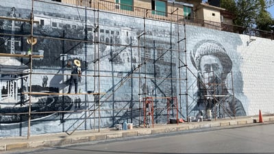 دیوارەکەی شەقامی سالم مێژووی لەسەر دەنەخشێندرێت