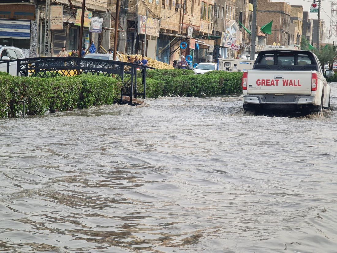 صور من السماوة اليوم: الأمطار أغرقت شوارع حي الصدر والضجرية والعسكري
