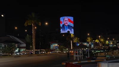 صور رئيس الجمهورية انتشرت في كل مكان ببغداد الليلة