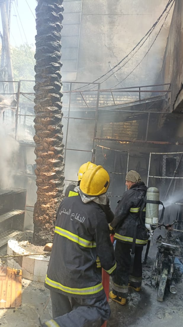 صور وفيديو: الدخان يغطي سماء الكرادة لكن تمت السيطرة على النيران