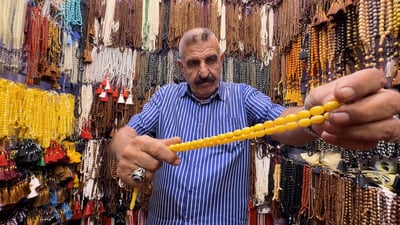 In Ashar market, stones and prayer beads carry healing claims