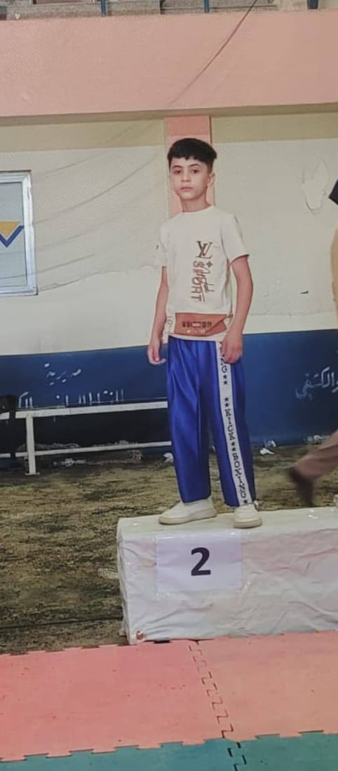 بعمر 11 عاماً.. فتى من الديوانية يحصد فضية “كيك بوكسينغ” العراق في النجف