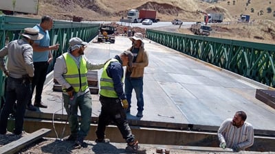 لەمەودا پردە ئاسنەکەی ناڵپارێز کەمتر تەقەتەق دەکات