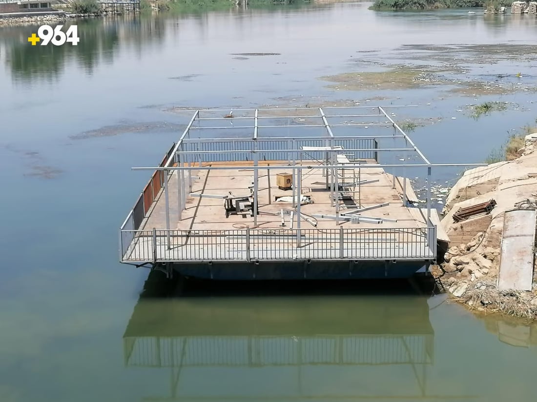 Anticipating launch of first mobile café on abandoned ferry in Hit, Iraq