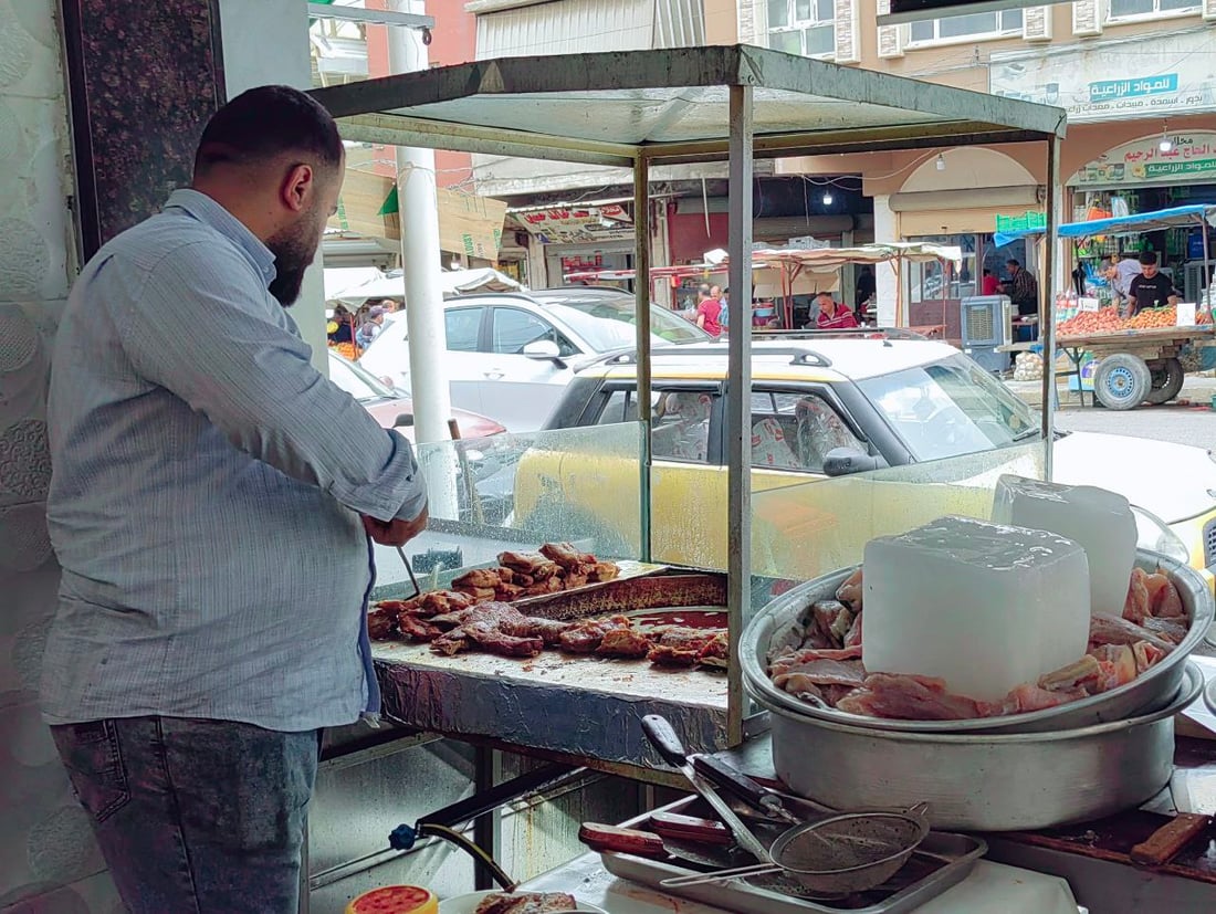 صور: سوق أسماك الموصل الجمعة.. منافسة حامية بين جرّي الناصرية والسمتي المحلي