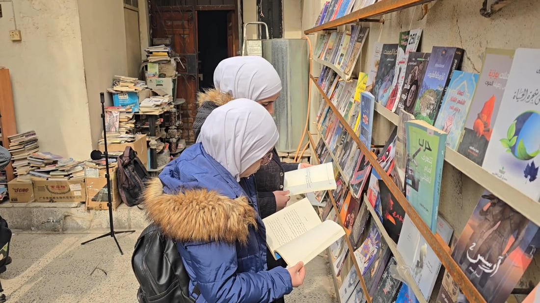 Retired librarian transforms home storage into community library in Mosul