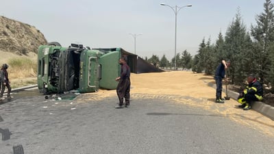 لە سلێمانی بارهەڵگرێک بە بارێک گەنمەوە وەرگەڕا