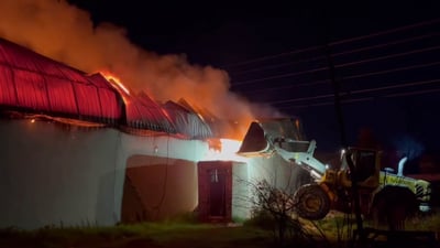 دیواری کۆگاکان دەڕوخێنین بۆ ئەوەی بگەین بەسەرچاوەی ئاگرەکە