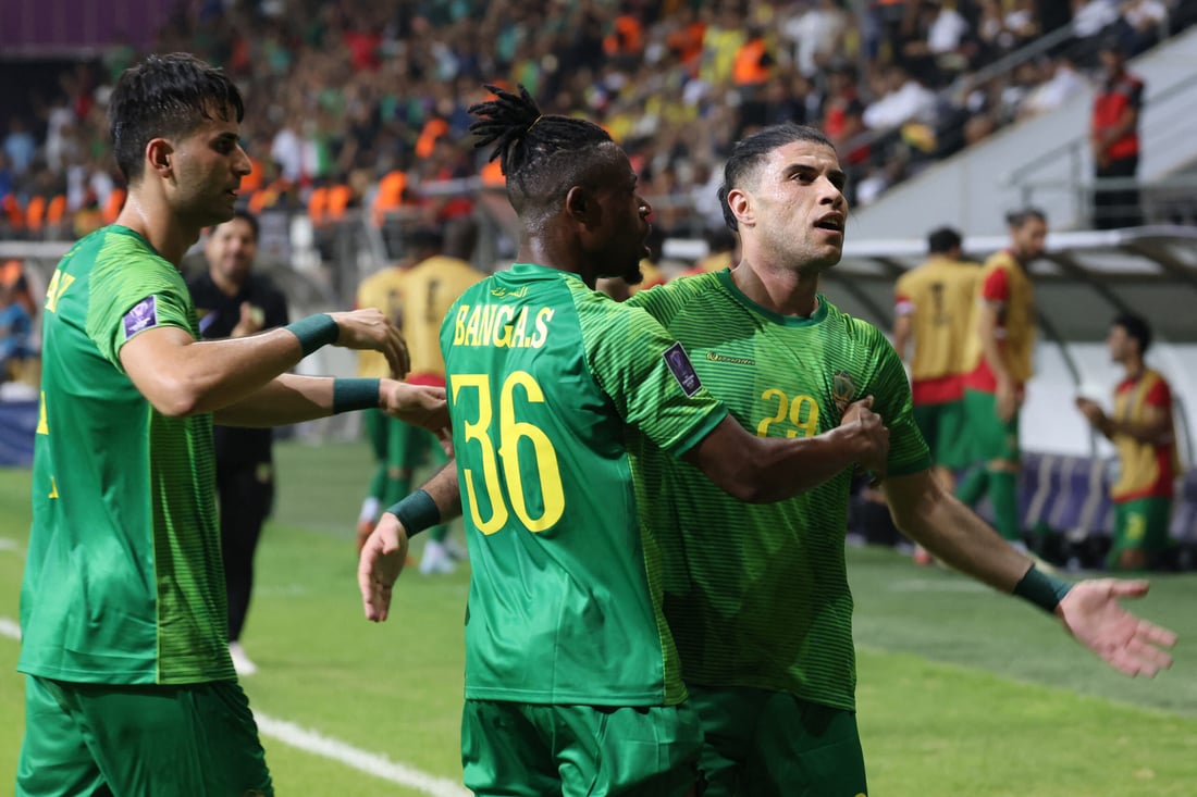Shorta's Iraqi forward Mohammed Dawood celebrates scoring his team's first goal during the AFC Champions League Elite West Region football match between Al-Shorta and Al-Nassr