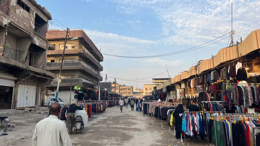Second-hand winter clothes market in Basra offers global brands at bargain prices