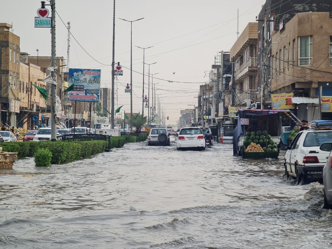 صور من السماوة اليوم: الأمطار أغرقت شوارع حي الصدر والضجرية والعسكري