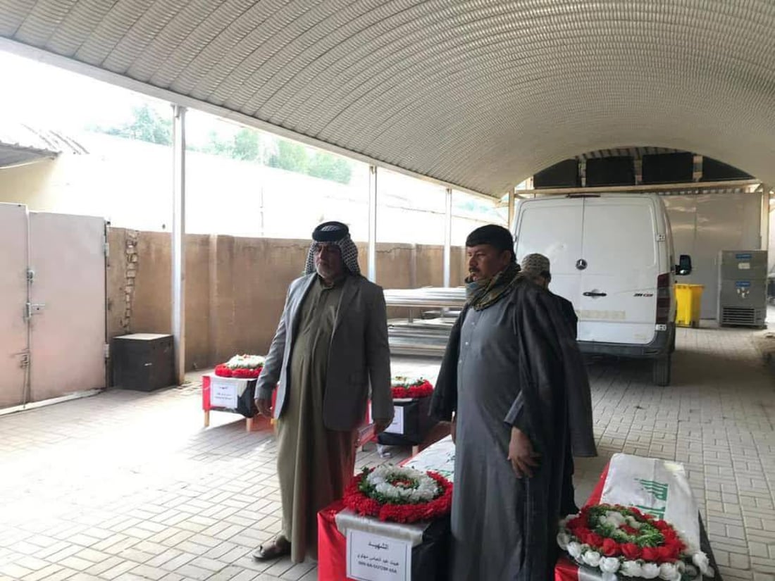 صور: النجف تشيّع 12 من ضحايا سجن بادوش
