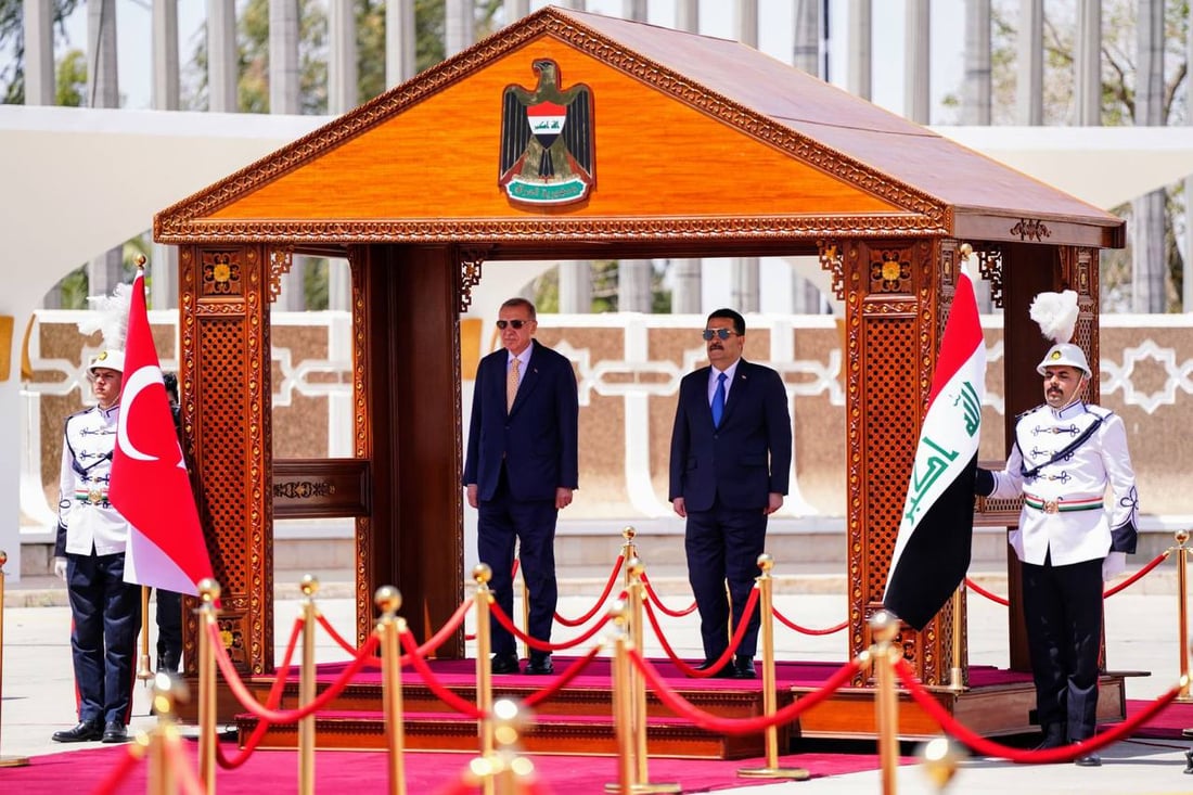 صور من مراسم استقبال الرئيس التركي أردوغان في مطار بغداد