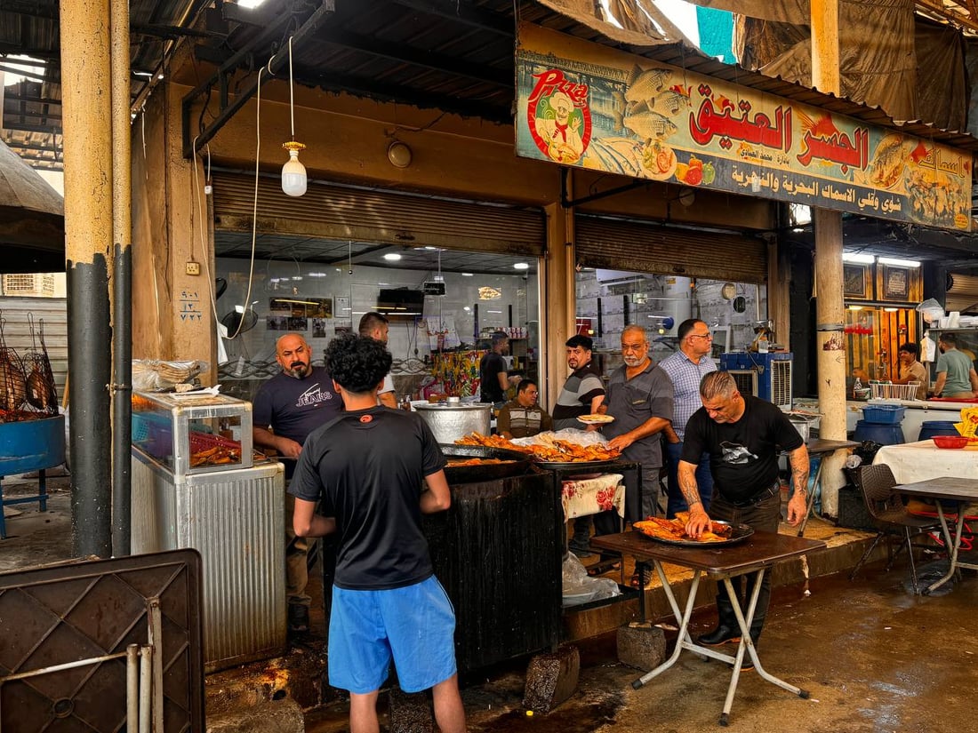 سوق السمك في الموصل ينتعش.. زوار أجانب يتوافدون يومياً (صور)