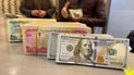 تحذيرات من تعديل ثالث لسعر الصرف.. ورضوخ البنك المركزي للمالية