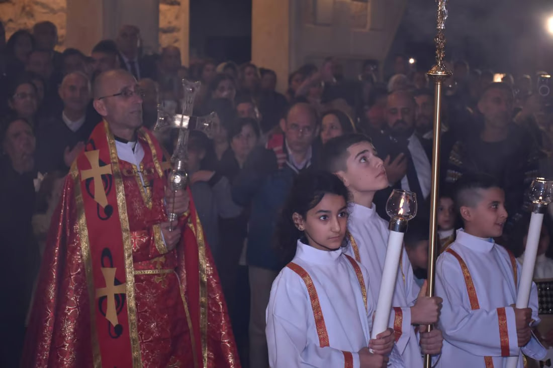 Photos: Somber Christmas Mass in Hamdaniya