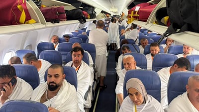 العراق ينجح بإعادة الحجاج قبل 5 أيام من جدولهم الزمني (صور)
