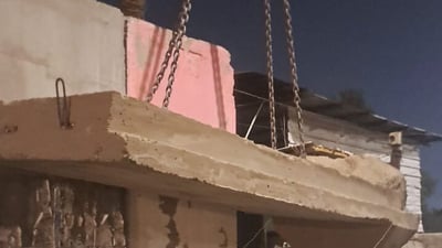 صور: رفع الكتل الكونكريتية من محيط جامع الرحمن في بغداد