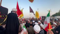 Iran supporters protest flight halt in Basra and Kufa, with seminary students chanting for Tehran