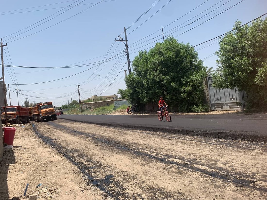 صور: أزمة شارع “حليجة” في بغداد انتهت والسكان يريدون منع الشاحنات