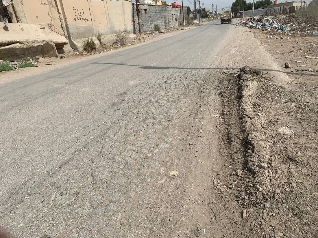 صور من هور رجب: شارع خط النفط مبلّط.. لكنه ضيق ومتخسف بسبب الشاحنات