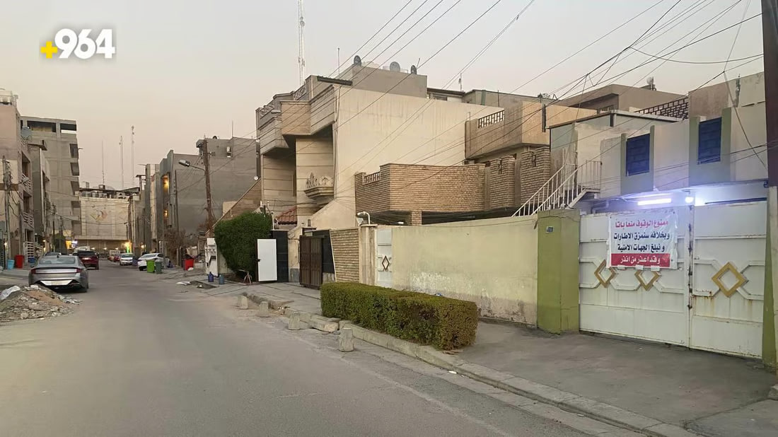 Residents in Mansour post warning signs amid parking crisis in the area