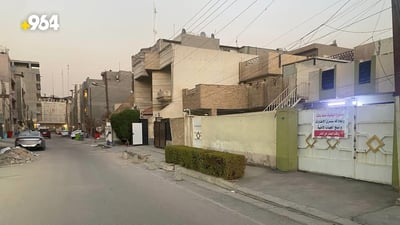 Residents in Mansour post warning signs amid parking crisis in the area