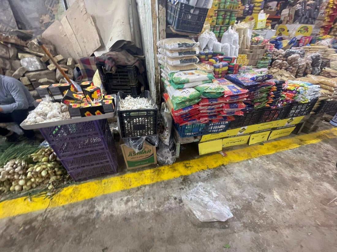 الفلوجة انتهت من ترسيم حدود سوق “النزيزة”.. لا بضائع بعد الخط الأصفر (صور) 