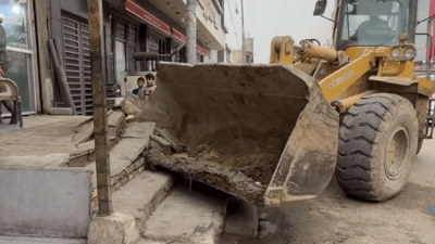 “الوحش الأصفر” يفتك بالمتجاوزين في حي الإسكان الصناعي وحملة كبرى في ذي قار