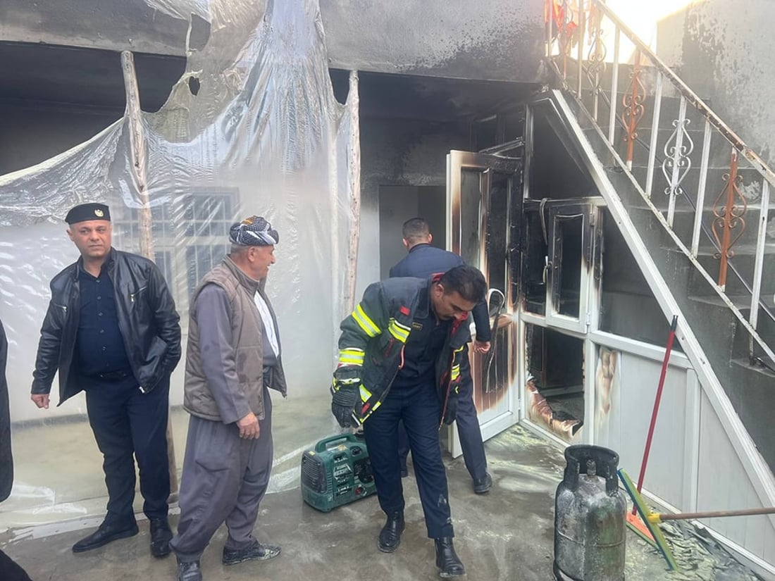 بوتڵێکی غاز ئاگری لە ماڵێک بەردا