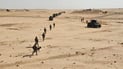 العمليات المشتركة تلاحق المتورطين بقصف حقول كردستان في صحراء الحضر (صور)