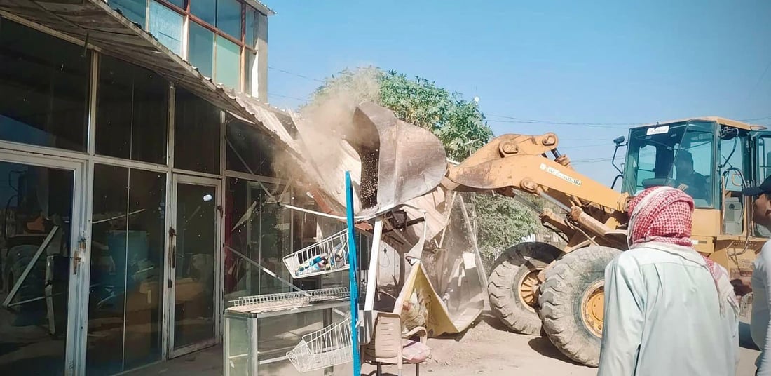 صور من النجف: الشفل الأصفر يقتلع البسطيات في شوارع الرسول والقديمة ومحيط الإمام