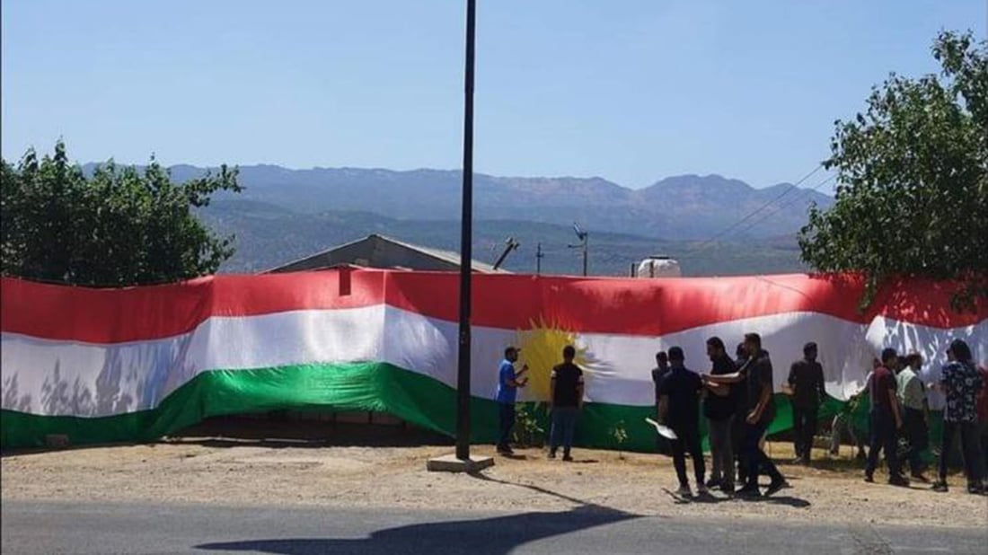 Villagers in Amedi’s Guharze raise Kurdistan flag in protest against Turkish military operations