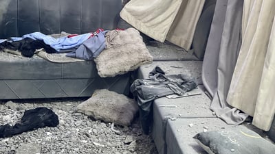 پاشماوەی درۆنێک کەوتووەتە ماڵێک لە گەڕەکی نووسەران