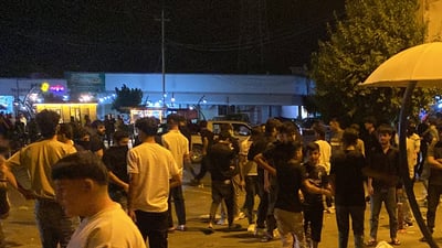 بەشێک لە گەنجانی قەڵادزێ لە ناو بازاڕی قەڵادزێ خۆپیشاندانیان ئەنجامدا